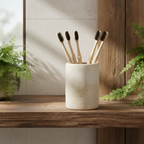 Bamboo toothbrushes in ceramic holder